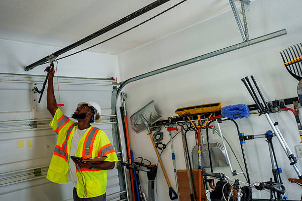 Professional Garage Door Panel Replacement technician working in Wilkes County County, NC